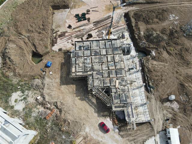 Biga Ticaret Park — şantiye genel görünümü, Ekim 2026 (havadan, kaba inşaat)